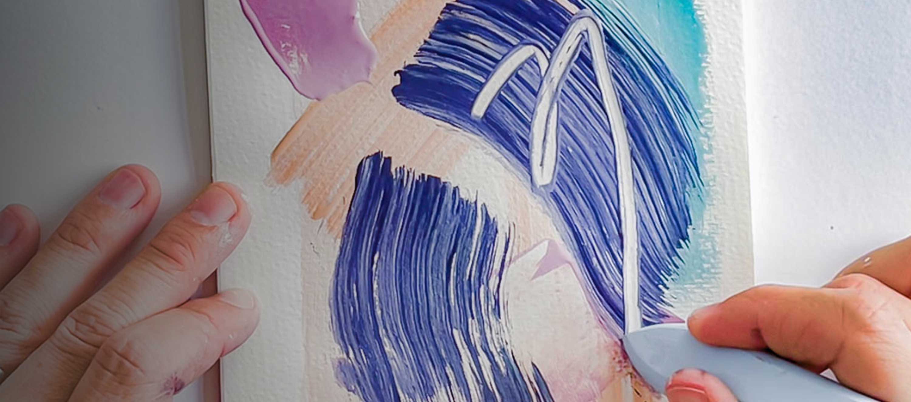 A person using a tool to paint a small canvas with abstract, curved shapes using Sculpd Canvas Painting Kit