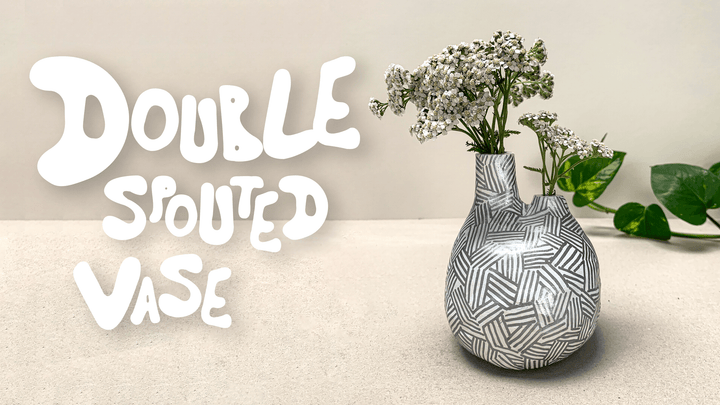 Double Spouted Vase with striped design made of Sculpd Pottery Kit Air-Dry Clay