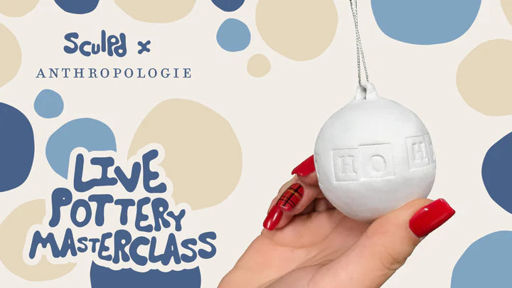 SculpdxAnthropologie Live Pottery Masterclass with a hand holding an unpainted christmas ornament made with Sculpd Pottery Kit