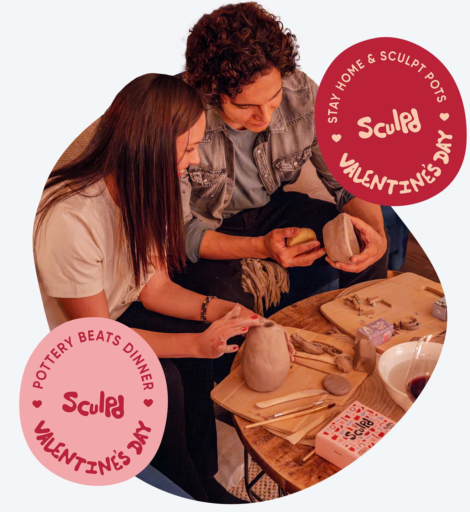 Two people shaping two Sculpd Pottery Kit pots for Valentines Date Night